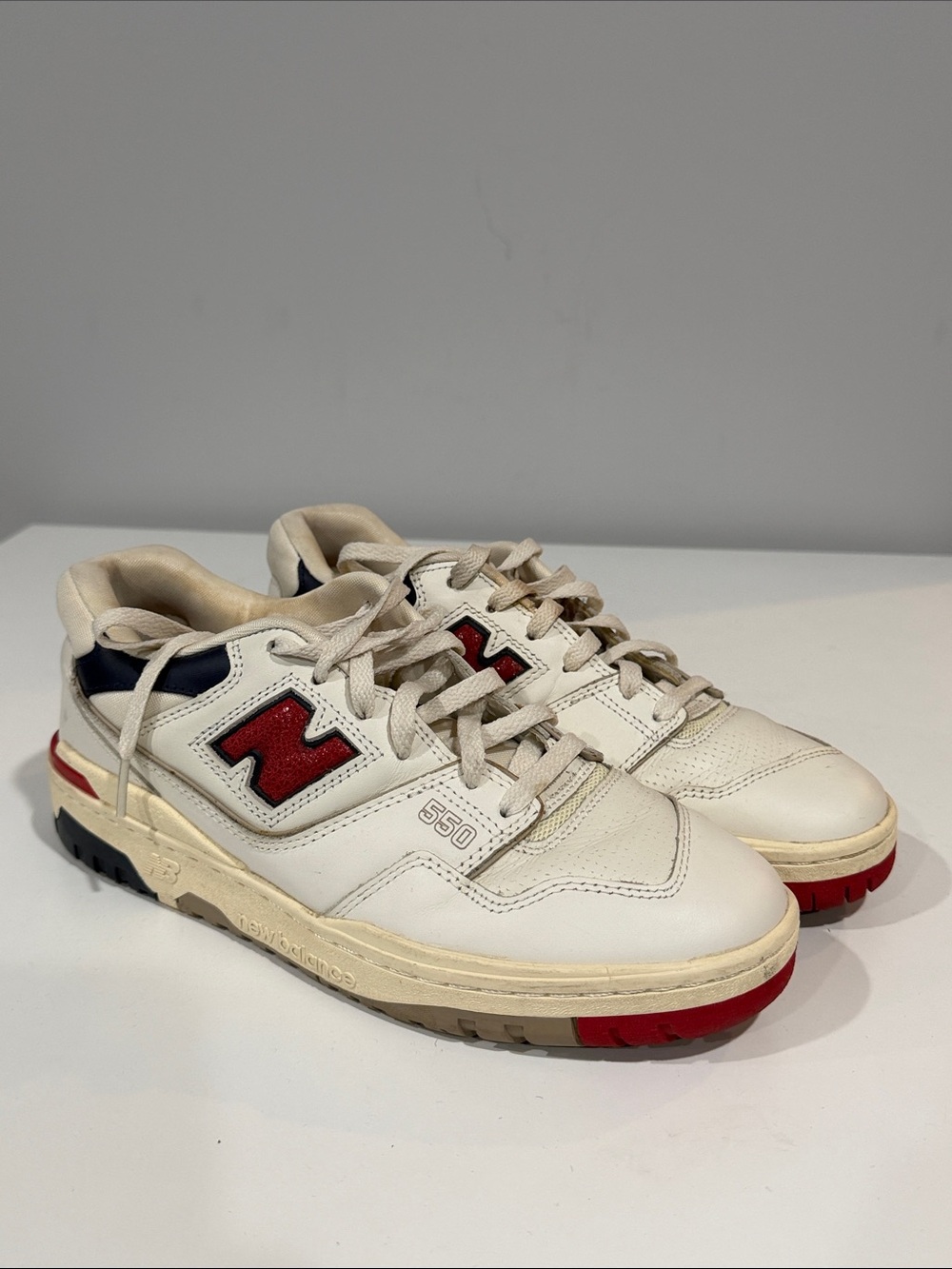 New Balance Men's 550 Sneakers in White with Red and Navy Accents